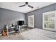 Gray bedroom with a workspace and a queen-size bed at 260 Trecastle Sq, Canton, GA 30114