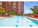 Inviting swimming pool with surrounding lounge area at 1820 Peachtree Nw St # 1507, Atlanta, GA 30309