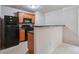 Kitchen with dark countertops and black appliances at 4029 Riverside Pkwy, Decatur, GA 30034