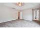 Bright bedroom with carpeted floor and access to bathroom at 4029 Riverside Pkwy, Decatur, GA 30034