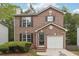 Brick two-story house with a two-car garage at 4029 Riverside Pkwy, Decatur, GA 30034