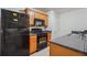 Kitchen with dark countertops and double sink at 4029 Riverside Pkwy, Decatur, GA 30034