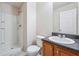 Bathroom with shower, toilet, and wood vanity at 4029 Riverside Pkwy, Decatur, GA 30034