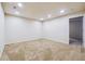 Bright, open basement space with carpeted floors and recessed lighting at 4029 Riverside Pkwy, Decatur, GA 30034