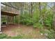 Wooded backyard with a partially visible deck at 4029 Riverside Pkwy, Decatur, GA 30034