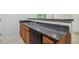 Kitchen with dark countertops and dishwasher at 4029 Riverside Pkwy, Decatur, GA 30034