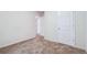 Well-lit bedroom featuring neutral walls and carpeting at 4029 Riverside Pkwy, Decatur, GA 30034