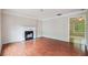Spacious living room featuring hardwood floors and a fireplace at 4029 Riverside Pkwy, Decatur, GA 30034