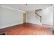 Bright living room with hardwood floors and access to stairway at 4029 Riverside Pkwy, Decatur, GA 30034