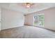 Spacious bedroom with carpeted floor and window at 4029 Riverside Pkwy, Decatur, GA 30034