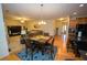 Bright dining area with hardwood floors and a table for six at 1311 Cozy Cove Ln, Lawrenceville, GA 30045