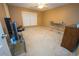 Simple bedroom with carpeted floor, window, and ceiling fan at 1311 Cozy Cove Ln, Lawrenceville, GA 30045