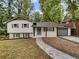 Beautiful home with a well-manicured lawn at 5720 Deerfield Trl, Atlanta, GA 30349
