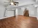 Finished basement with hardwood floors and staircase at 5720 Deerfield Trl, Atlanta, GA 30349