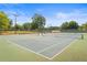 Two tennis courts with green surface and nets at 2965 Pharr Court South Nw # 108, Atlanta, GA 30305