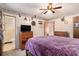 Spacious bedroom with a ceiling fan and dresser at 315 Watts Rd, Hiram, GA 30141