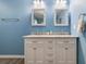 Bathroom with a double vanity and marble countertop at 315 Watts Rd, Hiram, GA 30141