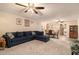 Spacious living room with sectional sofa and view of dining area and kitchen at 315 Watts Rd, Hiram, GA 30141