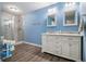 Bathroom with double vanity, marble countertop, and walk-in shower at 315 Watts Rd, Hiram, GA 30141