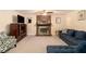 Living room with brick fireplace and comfy sectional sofa at 315 Watts Rd, Hiram, GA 30141