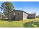 Gray house exterior with wooden steps and a grassy yard at 315 Watts Rd, Hiram, GA 30141