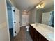 Bathroom features double vanity and shower stall at 410 S Fortune Way, Dallas, GA 30157