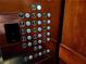 Close-up of an elevator panel with buttons and access control at 1101 Juniper Ne St # 1511, Atlanta, GA 30309