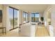 Modern kitchen with island, hardwood floors, and sliding glass doors at 318 Sandy Springs Cir # 360, Sandy Springs, GA 30328