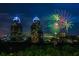Cityscape with two towers and fireworks display at night at 318 Sandy Springs Cir # 360, Sandy Springs, GA 30328