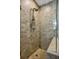 Walk-in shower with tiled walls and glass enclosure at 270 17Th Nw St # 1708, Atlanta, GA 30363