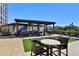 Community rooftop patio with seating and artificial turf at 270 17Th Nw St # 1708, Atlanta, GA 30363