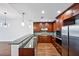 Modern kitchen with stainless steel appliances and granite counters at 270 17Th Nw St # 1708, Atlanta, GA 30363