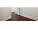 Hardwood floor hallway with white walls and doors at 270 17Th Nw St # 1708, Atlanta, GA 30363