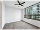 Bright bedroom with city views and carpet flooring at 270 17Th Nw St # 1708, Atlanta, GA 30363