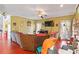 Living room with ceiling fan, sectional sofa, and fireplace at 3104 Brombley Se Dr, Conyers, GA 30013