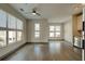 Bright and spacious living room with hardwood floors and large windows at 238 Walker Sw St # 32, Atlanta, GA 30313