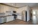 Modern kitchen with white cabinets, granite counters and stainless steel appliances at 238 Walker Sw St # 32, Atlanta, GA 30313