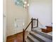 Two-story foyer with hardwood floors and a staircase at 709 Tribal Trl, Woodstock, GA 30188