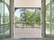 View from the house to a deck overlooking the backyard at 2701 Southwell St, Atlanta, GA 30305