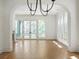 Bright dining room with hardwood floors and french doors leading to a deck at 2701 Southwell St, Atlanta, GA 30305