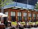 Outdoor seating area of a restaurant with flowers at 2701 Southwell St, Atlanta, GA 30305