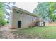Back of house with deck and stairs leading to a grassy yard at 1278 Lynwyn Se Ln, Atlanta, GA 30316