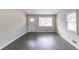 Living room with gray vinyl plank floors and recessed lighting at 1278 Lynwyn Se Ln, Atlanta, GA 30316