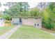 Tan brick ranch house with gray steps and landscaping at 1278 Lynwyn Se Ln, Atlanta, GA 30316
