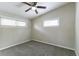 Well-lit bedroom with ceiling fan and carpet flooring at 1278 Lynwyn Se Ln, Atlanta, GA 30316