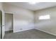 Large bedroom featuring neutral walls, carpet, and ample closet space at 1278 Lynwyn Se Ln, Atlanta, GA 30316