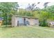Tan brick ranch house with gray steps and landscaping at 1278 Lynwyn Se Ln, Atlanta, GA 30316