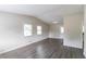 Open concept living room with gray vinyl plank floors at 1278 Lynwyn Se Ln, Atlanta, GA 30316