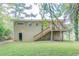 Back of house with deck, stairs, and fenced-in backyard at 1278 Lynwyn Se Ln, Atlanta, GA 30316