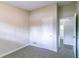 Bright bedroom with neutral walls, carpet, and access to a bathroom at 1278 Lynwyn Se Ln, Atlanta, GA 30316
